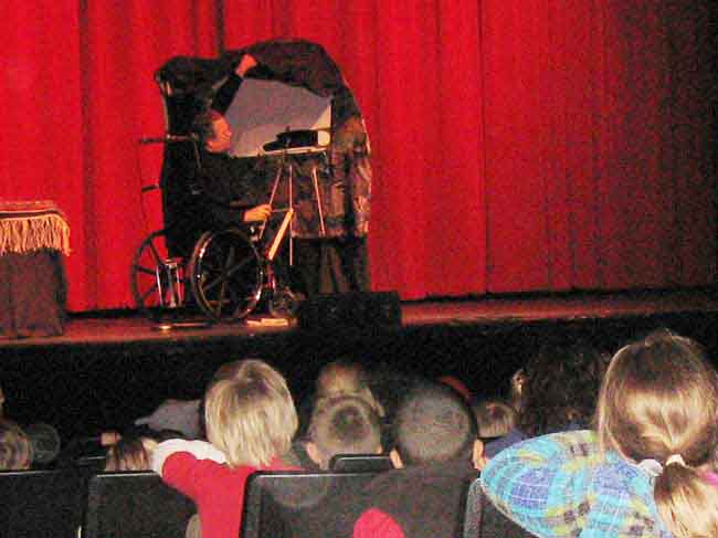 Richard demonstrating shadow puppets